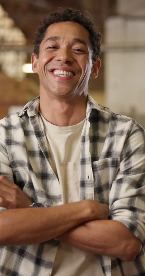 Carpentry, face or man in factory with arms crossed, handyman or about us in Stock Footage 340960598