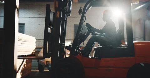 Carpentry, forklift or man in factory with timber, stock control or unloading Stock-Fotos
