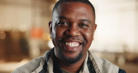 Carpentry, happy and face of black man in workshop for woodworking Stock Footage 341310536