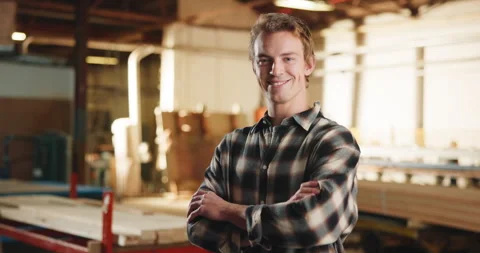 Carpentry, happy and face of man in workshop for woodworking, furniture and Stock Footage 341304984