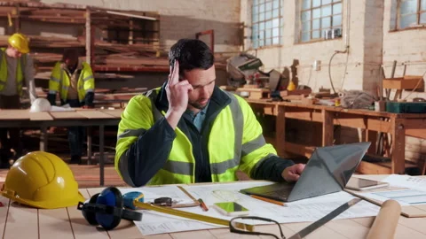 Carpentry, headache or man in workshop with laptop, brain fog or blueprint Stock Footage 338046695
