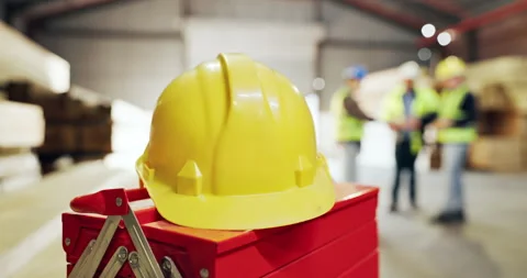 Carpentry, helmet and toolbox in warehouse with people shaking hands for Stock Footage 340001632