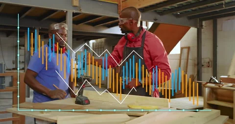 Carpentry instructor guiding trainee marking and drilling pilot hole before Stock Footage 316183927