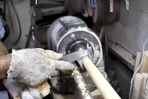 Carpentry machine for processing block of wood. Stock Photos