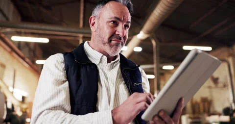 Carpentry, man and inspection in workshop with tablet, scroll or reading quality Stock Footage 340609757