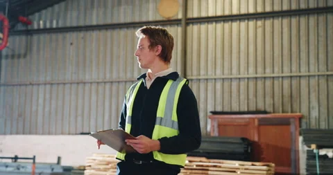 Carpentry, man and walk with paperwork in warehouse for timber audit, quality Stock Footage 341389235