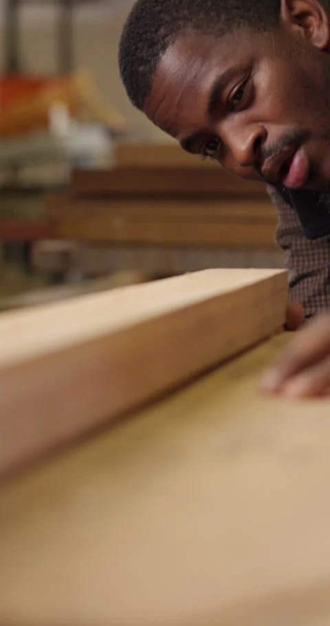 Carpentry, measure and man with dust for woodworking, furniture project and Stock Footage 340960942