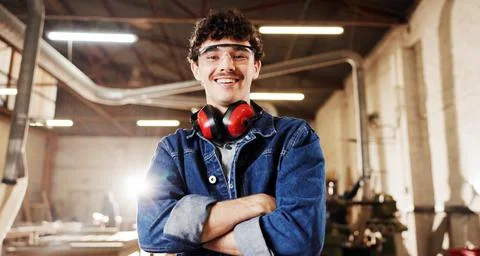 Carpentry, portrait or man in workshop with arms crossed, craftsman or prid.. Stock Photos