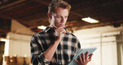 Carpentry, scroll and man in warehouse with tablet, inspection or reflection for Stock Footage 341404593