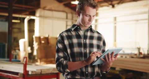 Carpentry, scroll and man in workshop with tablet, inspection and material for Stock Footage 341310277
