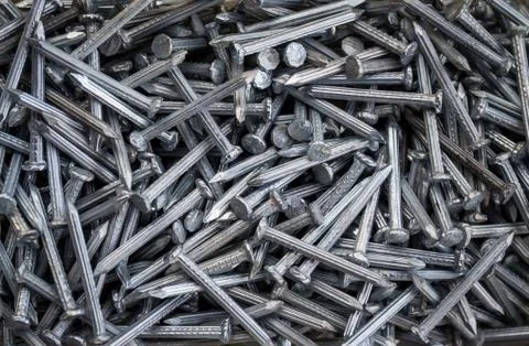 Carpentry shiny nails background Stock Photos