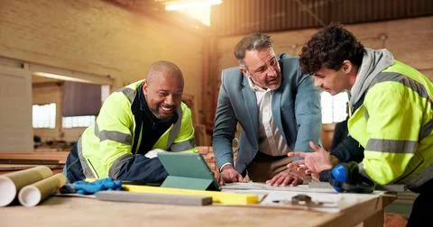 Carpentry, team and tablet in workshop for planning, apprentice insight and Stock Photos