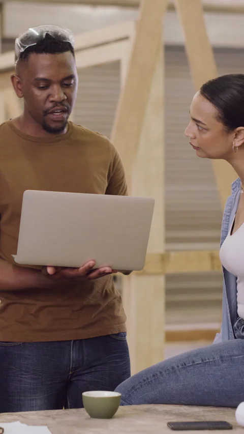 Carpentry, teamwork and people with laptop in meeting for furniture ideas, Stock Footage 329831320