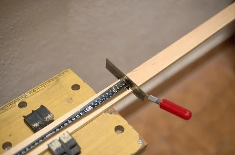 Carpentry tools in action and measuring tape. Stock Photos