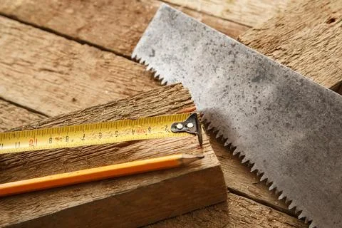 Carpentry tools on wooden surface Stock Photos