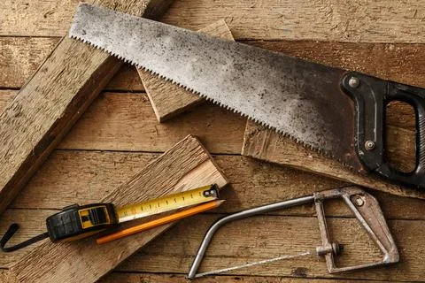 Carpentry tools on wooden surface Stock Photos