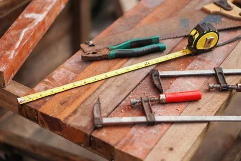 Carpentry tools on a wooden workbench Stock Photos