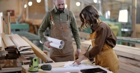 Carpentry workers designing at the joinery Stock Footage 146910071