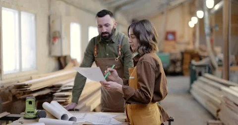Carpentry workers designing at the joinery Stock Footage 146910926