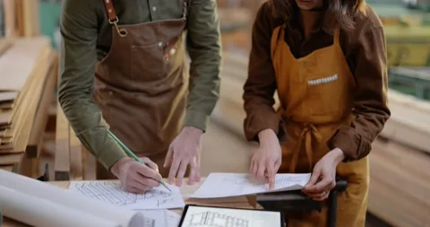 Carpentry workers designing some woodwork Stock Footage 146912683