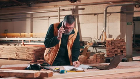 Carpentry, writing and man with phone call in workshop for project quote, new Stock Footage 337995369