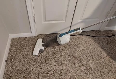 Carpet cleaing in progress Stock Photos