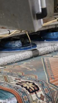 Carpet cleaning machine in action, practical and utilitarian process in indoor Stock Photos