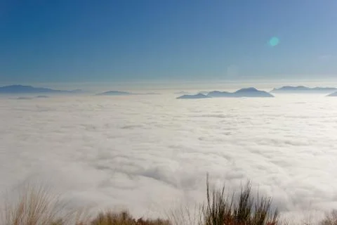 Carpet of clouds, alps above the clouds Stock Photos