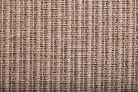Carpet covering background. Pattern and texture of natural straw color carpet Foto stock