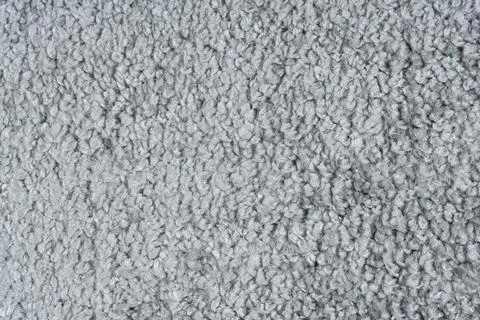 Carpet covering background. Pattern and texture of gray colour carpet. Copy Stock Photos