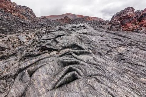 Carpet formation of cold lava of active volcano Stock Photos