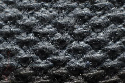Carpet made of soft material, shaped like a collection of woven strands of ya Stock Photos