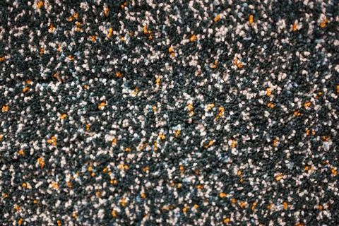 The carpet random pattern rug yarn dark colourful background. Stock Photos