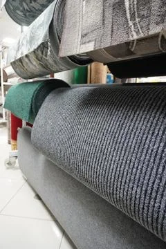 Carpet rolls in the store. Stock Photos