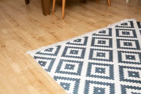 Carpet standing on the floor Stock Photos