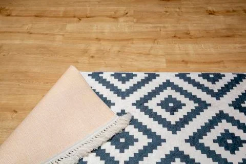 Carpet standing on the floor Stock Photos