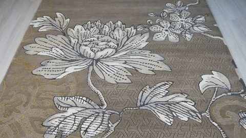 Carpet unrolling on the floor Stock Footage 105923355