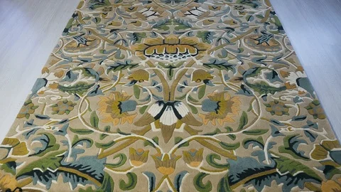 Carpet unrolling on the floor Stock Footage 105923389