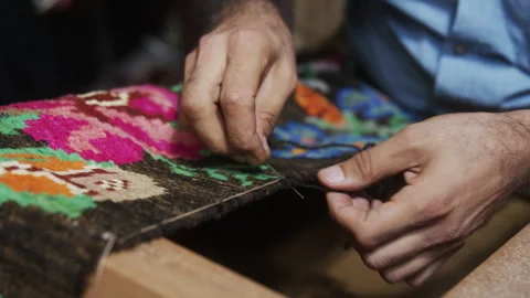 Carpet Weaving Handmade with Wool Stock Footage 268754321
