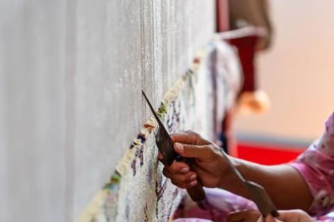 Carpet weaving using traditional techniques on a loom. , close-up of weaving  Stock-Fotos