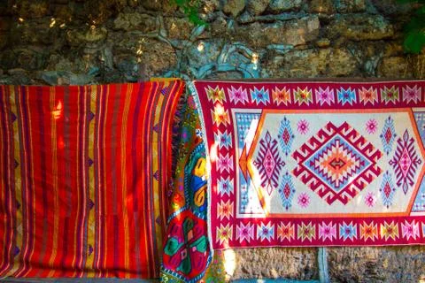 Carpets embroidered from threads of various bright colors Stock Photos
