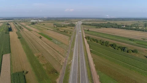 Carpets from the fields, next to the expressway, aerial view Stock Footage 123651004
