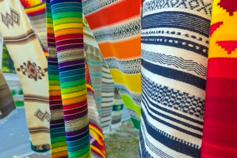 Carpets weaved on the machine manually. Close-up. Stock Photos