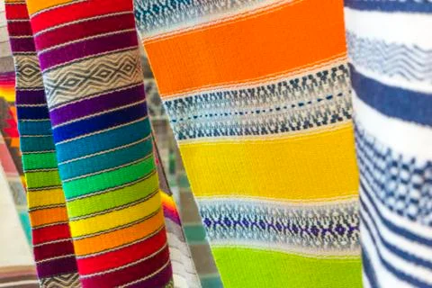 Carpets weaved on the machine manually. Close-up. Stock Photos