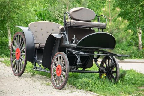 Carriage or brougham - an outdated means of transportation for a team of horses Stock Photos