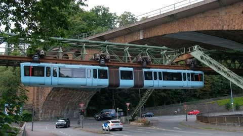 The carriage rides in the background of the old stone railway high bridge. Stock Footage 221554047
