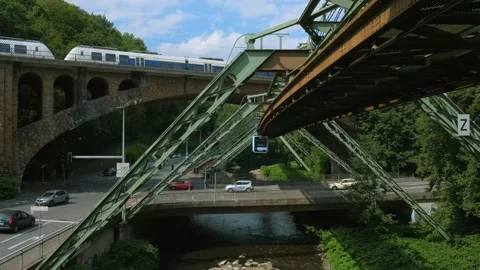 The carriage rides in the background of the old stone railway high bridge. Stock Footage 221554192