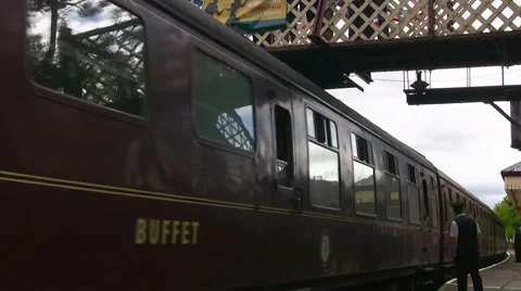 Carriages on a steam train leaving Ramsbottom railway station on the ELR Stock Footage 59169098