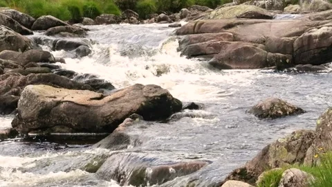 Carrick Lane River flowing over rocks, Ayrshire, Scotland, UK Stock Footage 202345336