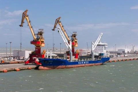 Carrier moored for loading in harbor of Calais, France Foto stock